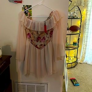 A shoulder mini dress that Zippers up in the back. Cider is the designer.